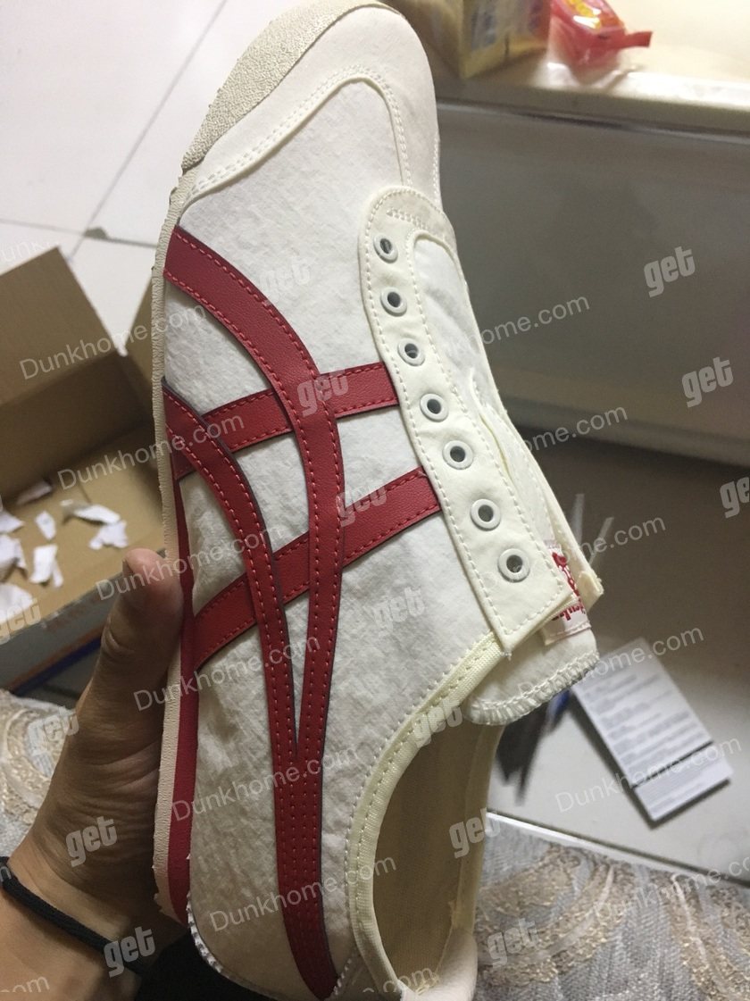 鬼冢虎鞋子,鞋垫粘着取不下来求大神鉴定